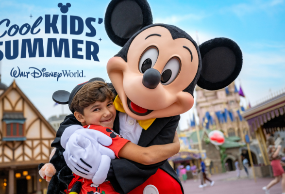 A child dressed in red hugs Mickey Mouse at Walt Disney World, with Cinderella’s Castle and other park buildings in the background. Text reads “Cool Kids' Summer” and “Walt Disney World.”.